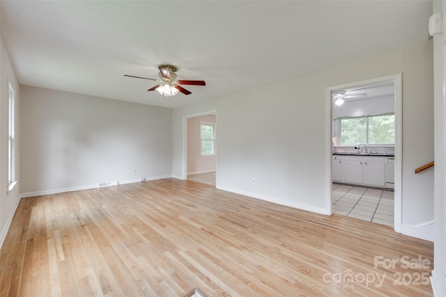810 Applegate Ct, Gastonia, NC 28054 - spare room featuring ceiling fan, plenty of natural light, and light wood-type flooring