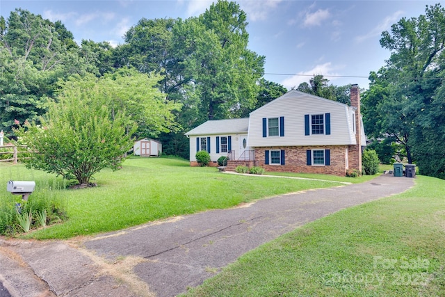 810 Applegate Ct, Gastonia, NC 28054 - split level home with a storage shed, a chimney, and brick siding