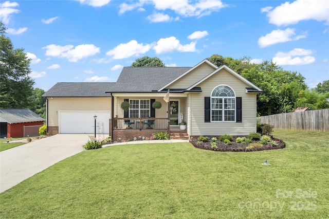 110 Bost Cir, Rockwell, NC 28138 - view of front of house featuring covered porch, driveway, a garage, and roof with shingles