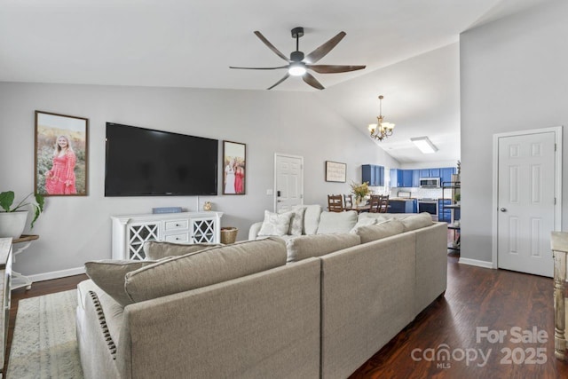 110 Bost Cir, Rockwell, NC 28138 - living area featuring ceiling fan, a chandelier, lofted ceiling, and dark wood-style flooring