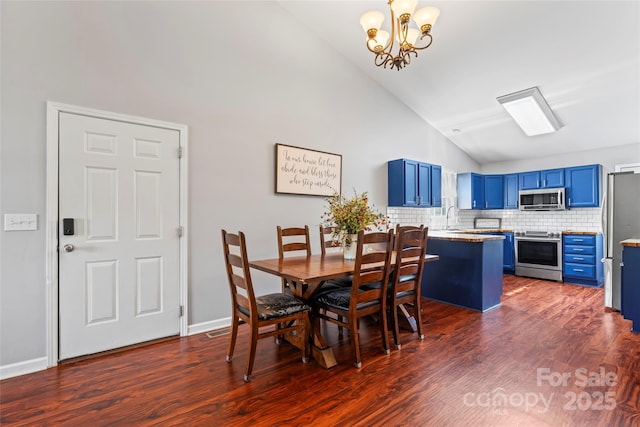 110 Bost Cir, Rockwell, NC 28138 - dining area with dark wood finished floors, a chandelier, and high vaulted ceiling