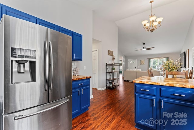 110 Bost Cir, Rockwell, NC 28138 - kitchen with stainless steel fridge with ice dispenser, wood counters, blue cabinets, a chandelier, and lofted ceiling