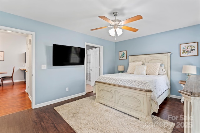 110 Bost Cir, Rockwell, NC 28138 - bedroom with dark wood-type flooring and a ceiling fan