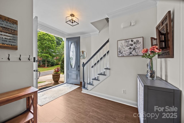 4108 Deerfield Dr NW, Concord, NC 28027 - entrance foyer featuring stairs, ornamental molding, and wood finished floors
