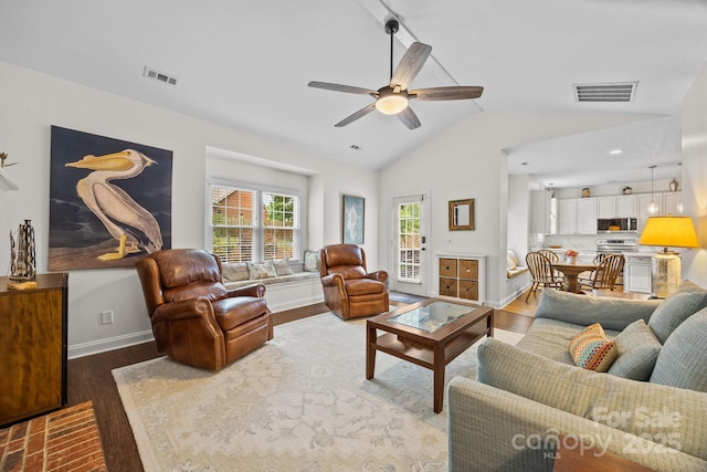 4108 Deerfield Dr NW, Concord, NC 28027 - living room featuring light wood-type flooring, vaulted ceiling, and a ceiling fan