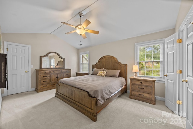 4108 Deerfield Dr NW, Concord, NC 28027 - bedroom featuring vaulted ceiling, light colored carpet, multiple windows, and ceiling fan