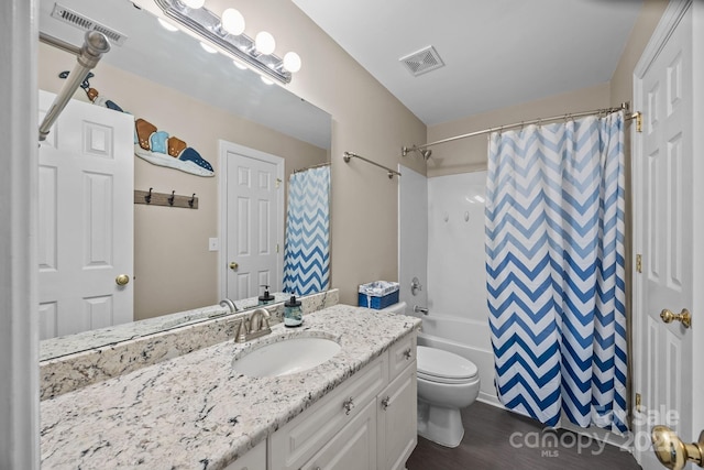 4108 Deerfield Dr NW, Concord, NC 28027 - full bathroom featuring vanity, wood finished floors, and shower / tub combo with curtain