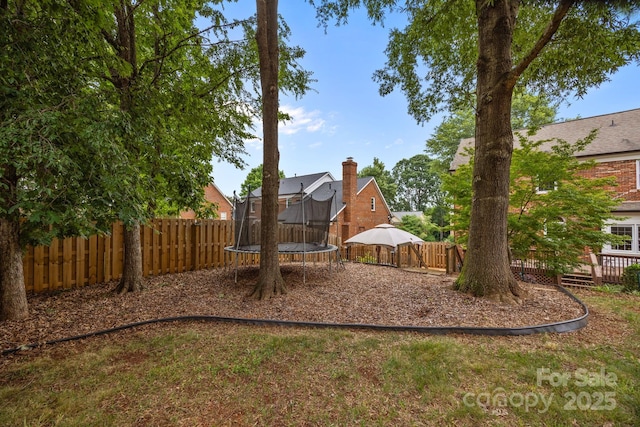 4108 Deerfield Dr NW, Concord, NC 28027 - fenced backyard featuring a trampoline
