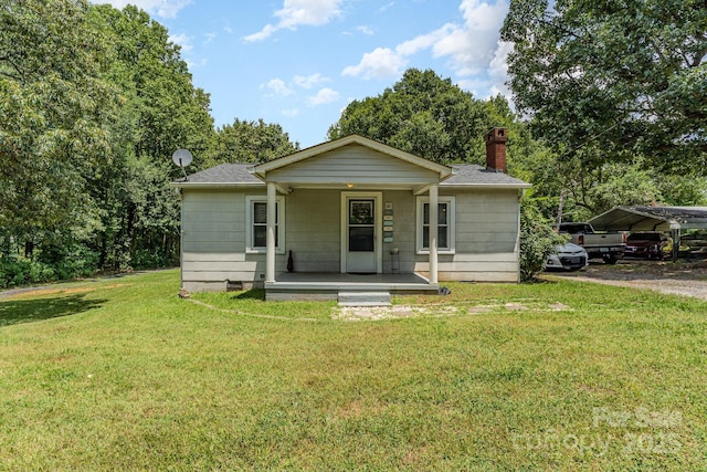 60 37th St NW, Hickory, NC 28601 - bungalow-style home featuring a porch, a chimney, a front yard, and a shingled roof