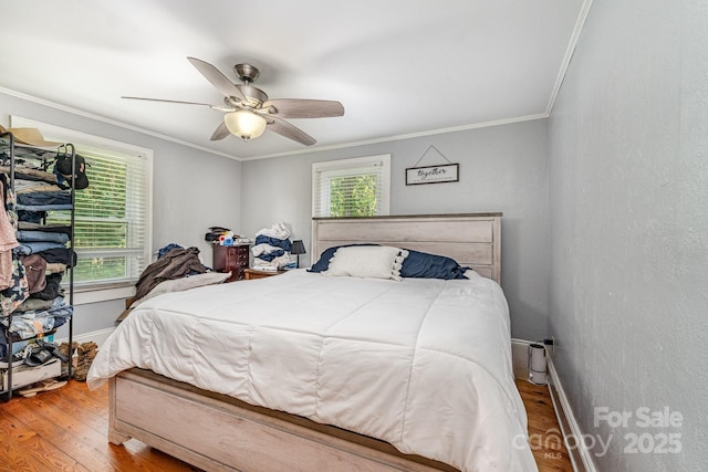 60 37th St NW, Hickory, NC 28601 - bedroom featuring crown molding, wood finished floors, and a ceiling fan