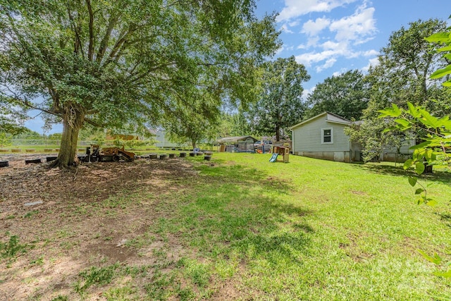 60 37th St NW, Hickory, NC 28601 - view of grassy yard with a playground