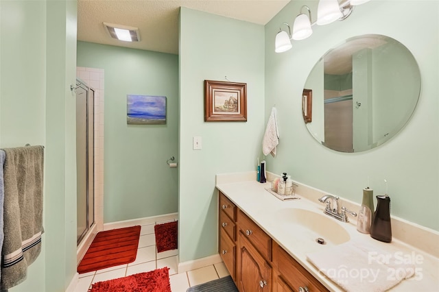 209 Camellia Way, Hendersonville, NC 28739 - bathroom featuring tile patterned floors, vanity, and a shower stall