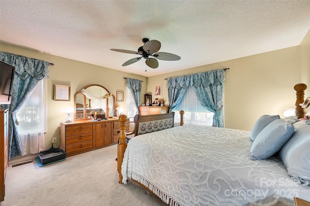 209 Camellia Way, Hendersonville, NC 28739 - bedroom with light carpet, a textured ceiling, and a ceiling fan