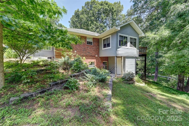 209 Camellia Way, Hendersonville, NC 28739 - view of front facade featuring brick siding