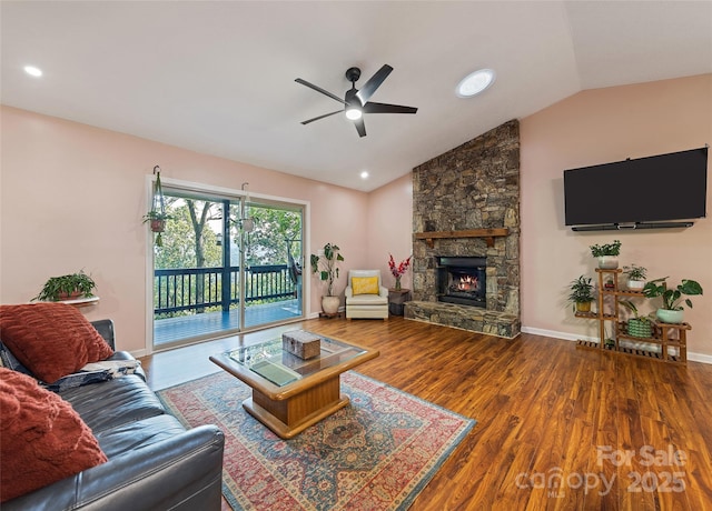 208 Tuckaway Rd, Waynesville, NC 28785 - living room featuring a ceiling fan, wood finished floors, vaulted ceiling, a fireplace, and recessed lighting