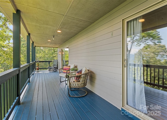 208 Tuckaway Rd, Waynesville, NC 28785 - view of wooden porch