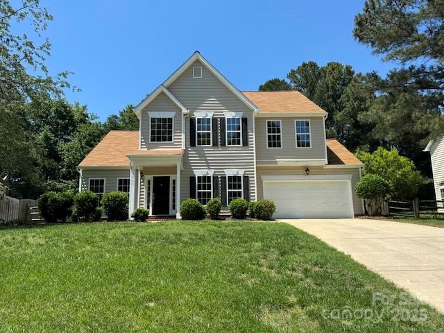 7563 Sedgebrook Dr W, Stanley, NC 28164 - view of front facade featuring driveway and a garage