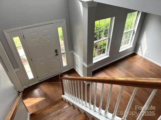 7563 Sedgebrook Dr W, Stanley, NC 28164 - foyer featuring wood-type flooring and stairs