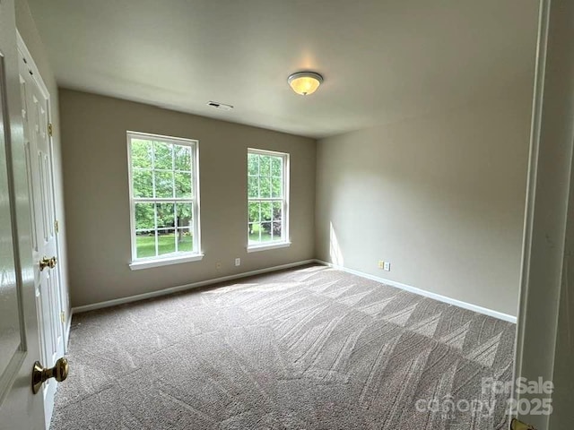 7563 Sedgebrook Dr W, Stanley, NC 28164 - unfurnished room featuring baseboards and carpet flooring