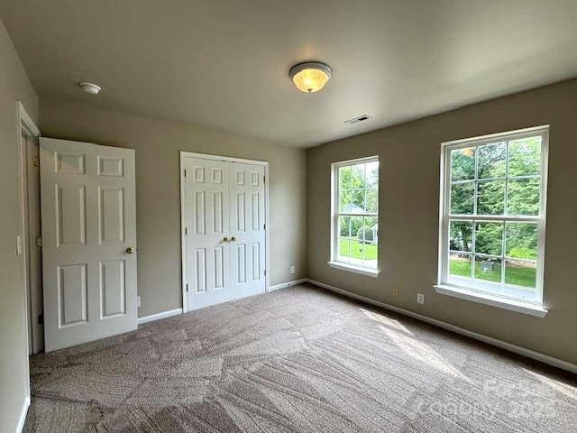 7563 Sedgebrook Dr W, Stanley, NC 28164 - unfurnished bedroom with carpet floors and a closet