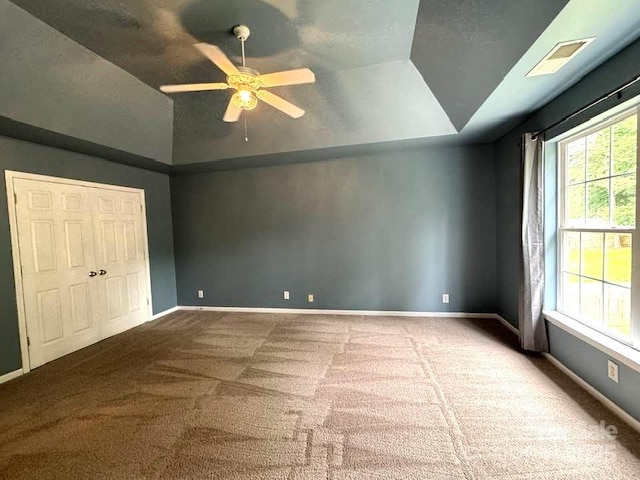 7563 Sedgebrook Dr W, Stanley, NC 28164 - unfurnished bedroom featuring carpet flooring, lofted ceiling, ceiling fan, and a closet