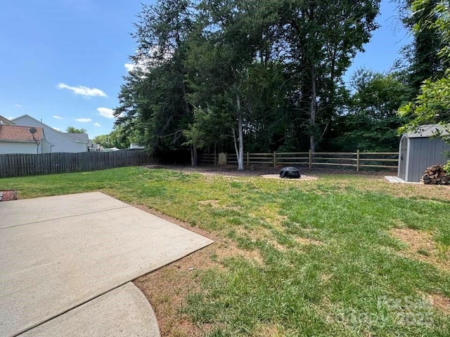 7563 Sedgebrook Dr W, Stanley, NC 28164 - fenced backyard featuring a patio and a storage unit