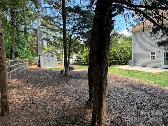 7563 Sedgebrook Dr W, Stanley, NC 28164 - fenced backyard featuring a storage shed and a patio