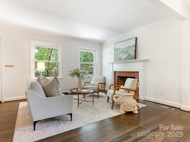 5123 Glenham Dr, Charlotte, NC 28210 - living room featuring ornamental molding, a fireplace, and wood finished floors