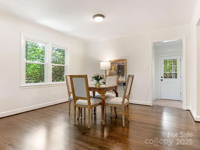 5123 Glenham Dr, Charlotte, NC 28210 - dining room with dark wood-style floors and ornamental molding