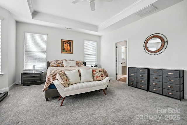 2026 Union Grove Ln, Indian Trail, NC 28079 - bedroom featuring carpet floors, a tray ceiling, crown molding, ceiling fan, and connected bathroom