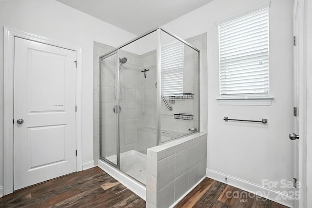 2026 Union Grove Ln, Indian Trail, NC 28079 - bathroom featuring a shower stall and wood finished floors