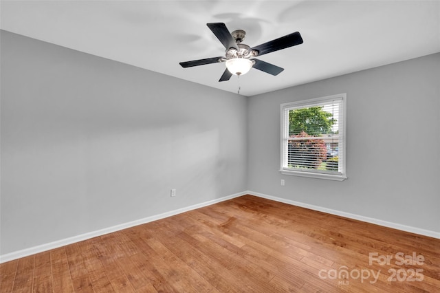 1940 Tyvola Rd, Charlotte, NC 28210 - spare room with wood finished floors and a ceiling fan