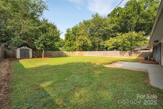 1940 Tyvola Rd, Charlotte, NC 28210 - fenced backyard with a storage unit and a patio area