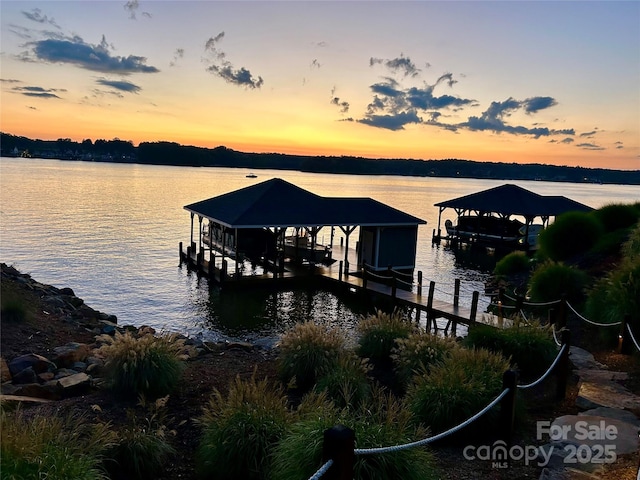 347 Landing Trl, Mount Gilead, NC 27306 - dock area with boat lift and a water view