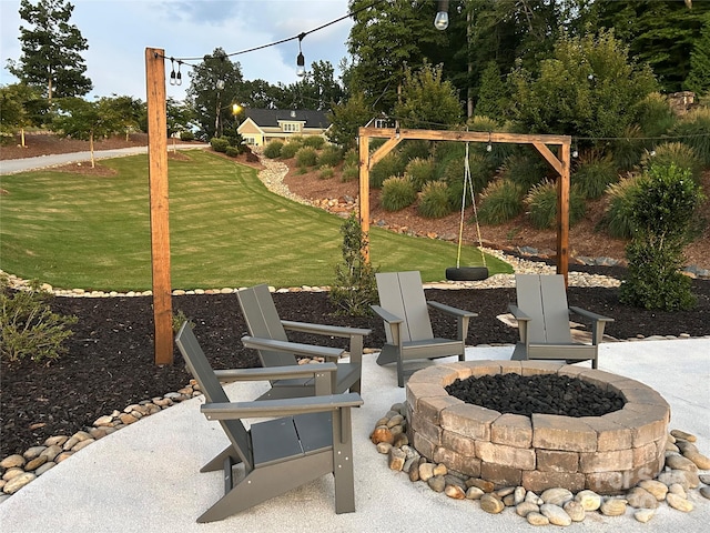 347 Landing Trl, Mount Gilead, NC 27306 - view of patio featuring an outdoor fire pit