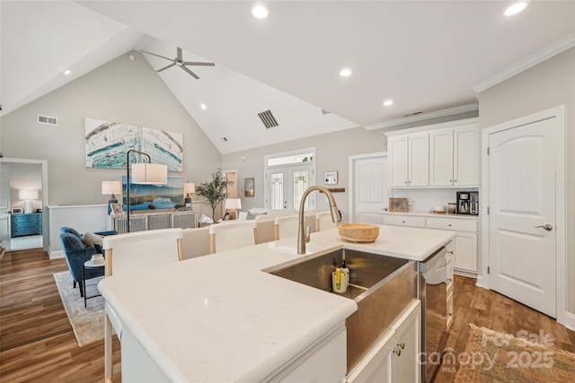347 Landing Trl, Mount Gilead, NC 27306 - kitchen with open floor plan, stainless steel dishwasher, recessed lighting, a ceiling fan, and wood finished floors