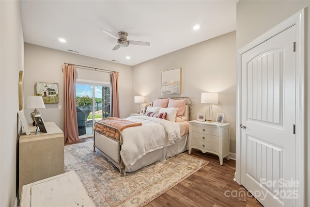 347 Landing Trl, Mount Gilead, NC 27306 - bedroom featuring access to exterior, wood finished floors, ceiling fan, and recessed lighting