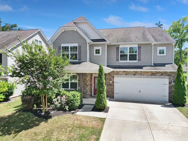 10328 Ebbets Rd, Charlotte, NC 28273 - craftsman-style home featuring driveway, board and batten siding, an attached garage, a front yard, and stone siding