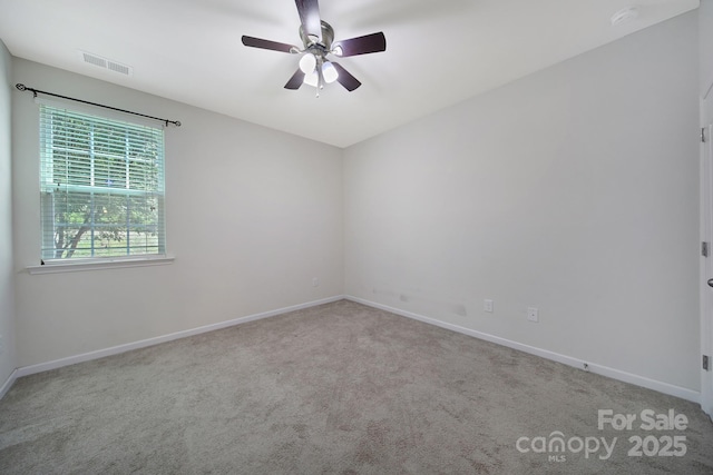 10328 Ebbets Rd, Charlotte, NC 28273 - carpeted empty room featuring a smoke detector and a ceiling fan