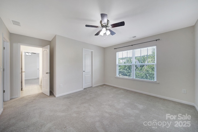10328 Ebbets Rd, Charlotte, NC 28273 - unfurnished bedroom with carpet floors and ceiling fan