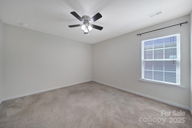 10328 Ebbets Rd, Charlotte, NC 28273 - empty room featuring carpet, ceiling fan, and a smoke detector