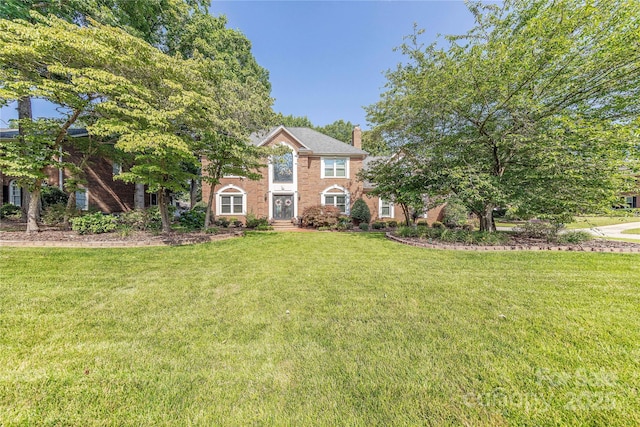 3100 Shady Grove Ln, Matthews, NC 28104 - view of front of home featuring a front lawn and a chimney