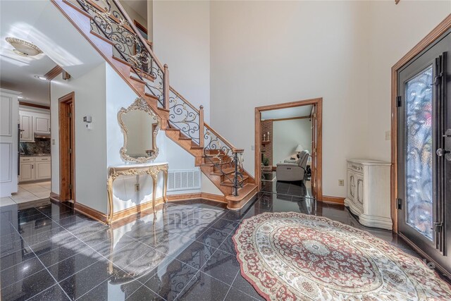 3100 Shady Grove Ln, Matthews, NC 28104 - foyer with a high ceiling, granite tiled floors, and stairs