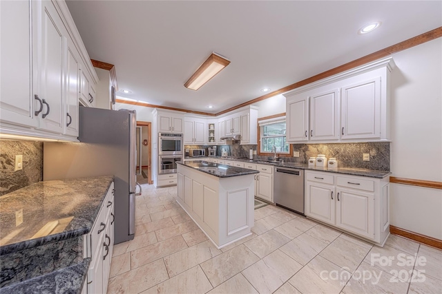3100 Shady Grove Ln, Matthews, NC 28104 - kitchen featuring stainless steel appliances, decorative backsplash, white cabinets, ornamental molding, and recessed lighting
