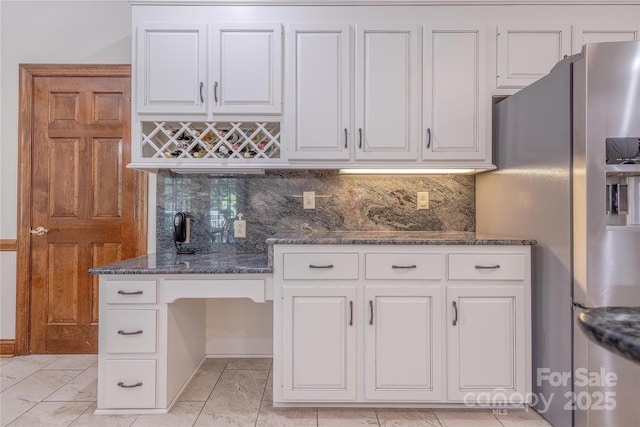 3100 Shady Grove Ln, Matthews, NC 28104 - kitchen with stainless steel fridge, white cabinets, backsplash, and dark stone countertops