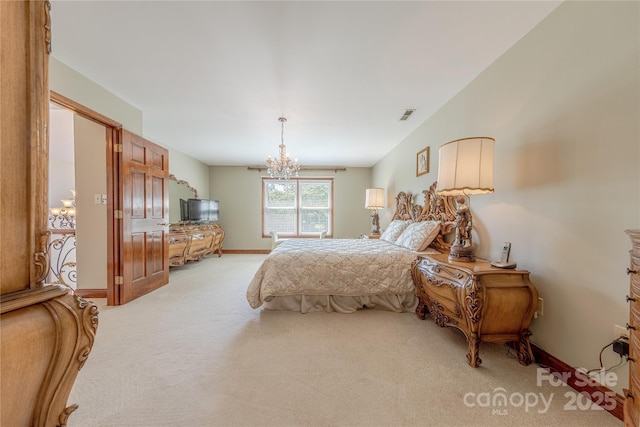3100 Shady Grove Ln, Matthews, NC 28104 - bedroom featuring light colored carpet and a chandelier