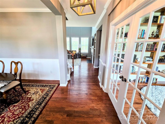 10302 Newbridge Rd, Charlotte, NC 28278 - corridor featuring french doors, dark wood-style flooring, and crown molding