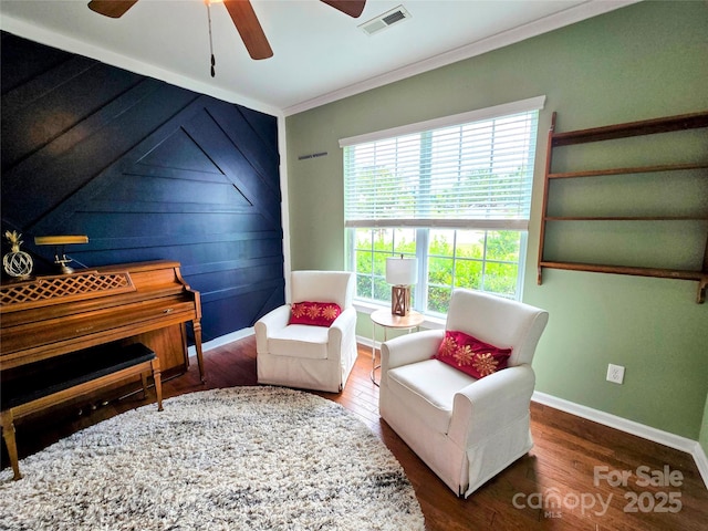 10302 Newbridge Rd, Charlotte, NC 28278 - sitting room with wood finished floors, a ceiling fan, and ornamental molding