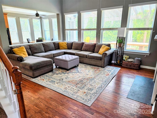 10302 Newbridge Rd, Charlotte, NC 28278 - living area featuring plenty of natural light, a ceiling fan, and dark wood-style flooring
