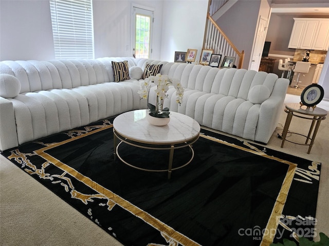 935 Wind Carved Ln, Monroe, NC 28110 - living room featuring carpet floors and stairs